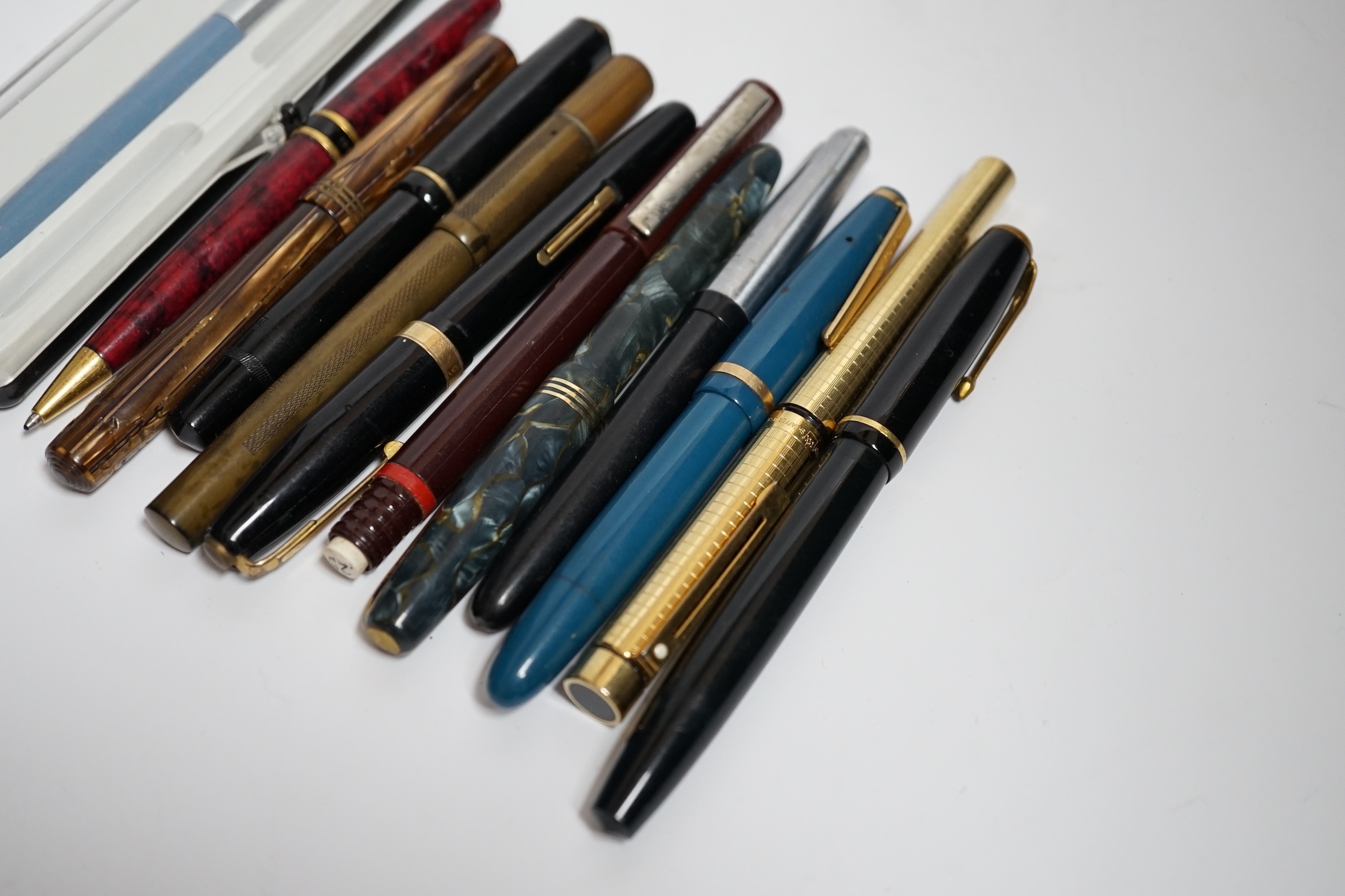 A quantity of fountain pens including Watermans and Sheaffer